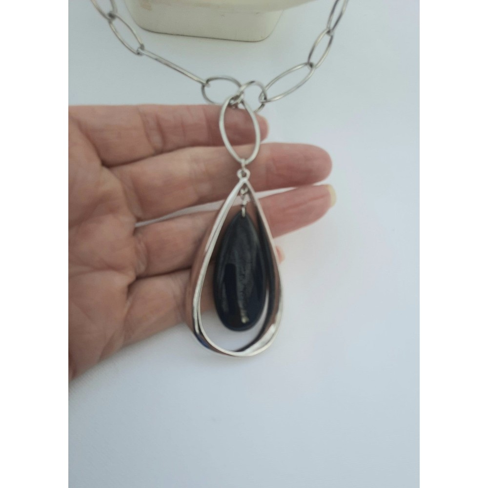 Lia Sophia necklace, silver tone with black pendant. 28 inches long with 2 1/2